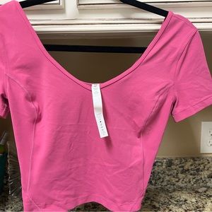 Lulu Align Crop Top - Brand New. never worn tags have been removed. 15 inch long